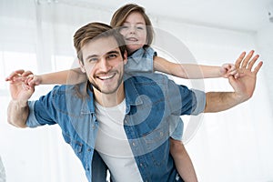 Happy loving family. Father and his daughter child girl playing together. Father`s day concept