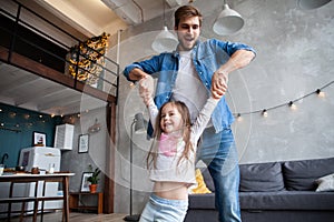 Happy loving family. Father and his daughter child girl playing together. Father`s day concept.