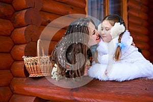 Happy loving family. mother and child girl playing, kissing and hugging