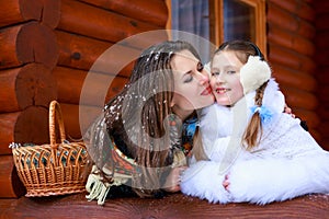 Happy loving family. mother and child girl playing, kissing and hugging