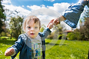 Happy loving family. mother and child playing in the park