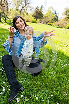 Happy loving family. mother and child playing in the park