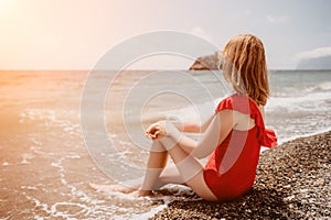 Happy loving family mother and daughter having fun together on the beach. Mum playing with her kid in holiday vacation