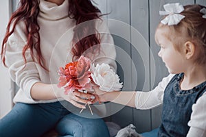 Happy loving family. Mother and her daughter child girl playing