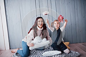 Happy loving family. Mother and her daughter child girl playing together