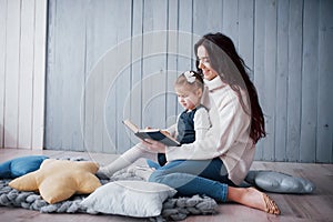 Happy loving family. Mother and her daughter child girl playing together