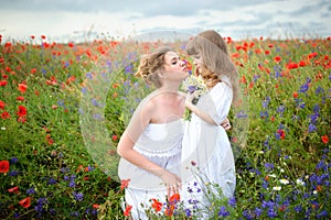 Happy loving mom and Daughter. Mother and child girl playing and