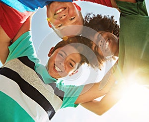 Happy, low angle and portrait of children in sunshine for friendship, playing and fun together. Diversity, youth and