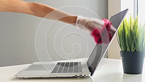 Happy Maid Cleaning Keyboard At Desk In Office