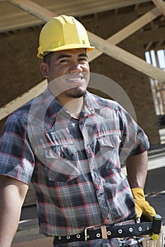 Happy Male Architect Wearing Hardhat