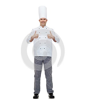 Happy male chef cook showing thumbs up