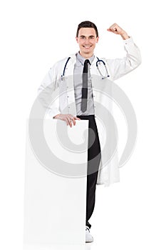 Happy male doctor with healthy product