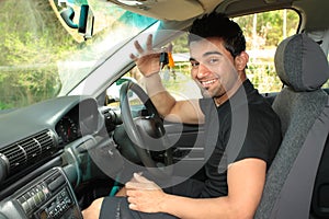 Happy male driver holding car keys