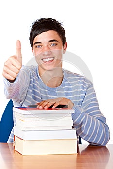 Happy male student with books show thumb up