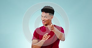Happy man, applause and pointing to you in studio for congratulations isolated on a blue background mockup space