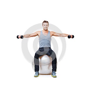 Happy man, ball balance or portrait in dumbbell workout performance, wellness or white background. Strong athlete