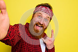 Happy man with beard and bandana in head photo