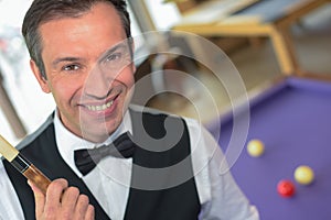 Happy man billiard man playing