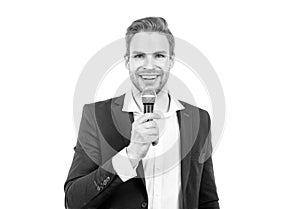 Happy man in business formalwear speak into microphone giving speech isolated on white, conferencier