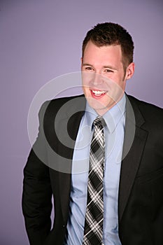 Happy man in business suit smiling