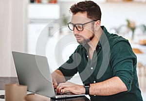 Happy man businessman, freelancer, student working at computer a