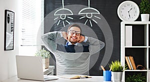 Happy man businessman, freelancer, student working at computer a