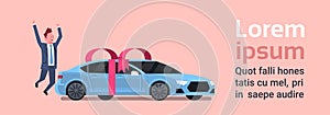 Happy Man Buy New Car Over Vechicle With Ribbon And Bow Background