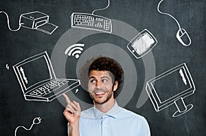 Happy man with computer technology