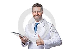 Happy man doctor giving thumbs-up.Telehealth doctor using tablet. Telehealthcare services