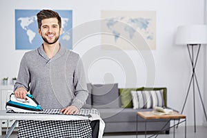 Happy man doing houseworks