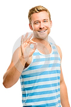 Happy man giving okay sign - portrait on white background