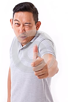 Happy man giving thumb up gesture