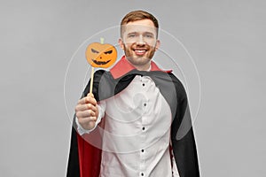 Happy man in halloween costume of vampire