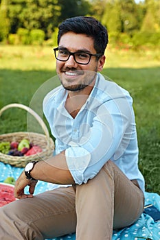 Happy Man. Handsome Smiling Young Male Outdoors In Park