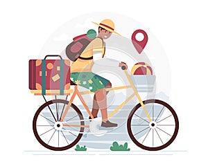 Happy man in a hat riding a bicycle