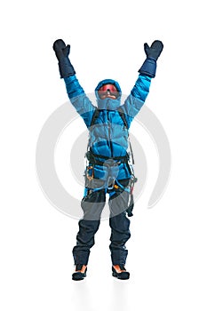 Happy man, hiker in jacket, gloves and goggles standing with hands raised isolated on white background. Comfortable and