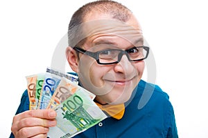 Happy man holding european money