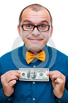 Happy man holding hundred dollars