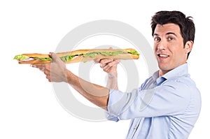 Happy Man Holding Long Baguette Sandwich
