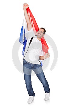 Happy Man Holding An Netherlands Flag