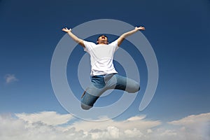 Happy man jumping