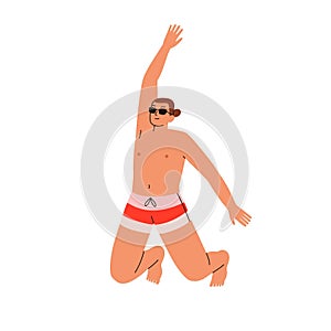 Happy man jumping up, joyful with summer vacation. Young excited cheerful energetic guy in sunglasses, swimwear, beach