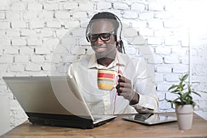 Happy man with a laptop