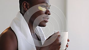 Happy man morning black guy eye patches coffee