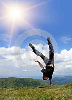 Happy man in mountains