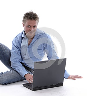 Happy man with open laptop