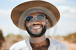 Happy man, portrait and safari travel outdoors for vacation, holiday and adventure to explore in South Africa. Face