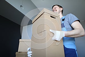 Happy man in protective gloves