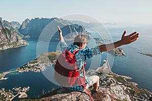 Happy Man raised hands traveling in Norway