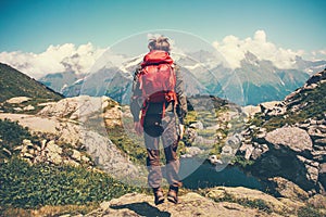 Happy Man with red backpack jumping levitation